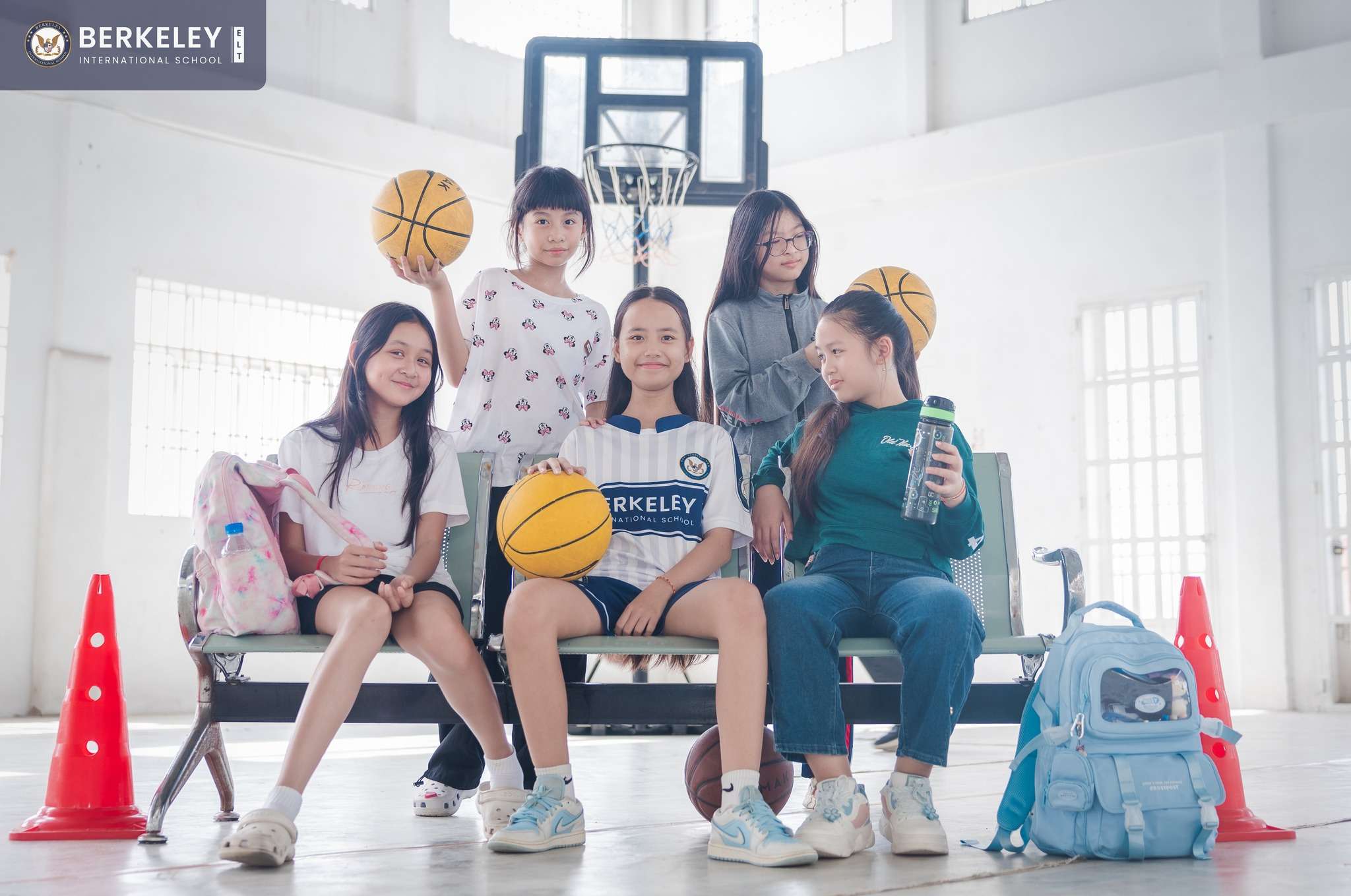 Students at Berkeley International School participating in summer class activities including basketball, group cooking, and dance, promoting creativity, teamwork, and practical skills.