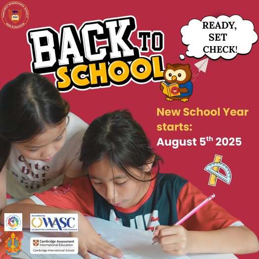 Two East-West International School students working together on schoolwork under a "Back to School" announcement for the new academic year starting August 5th, 2025.