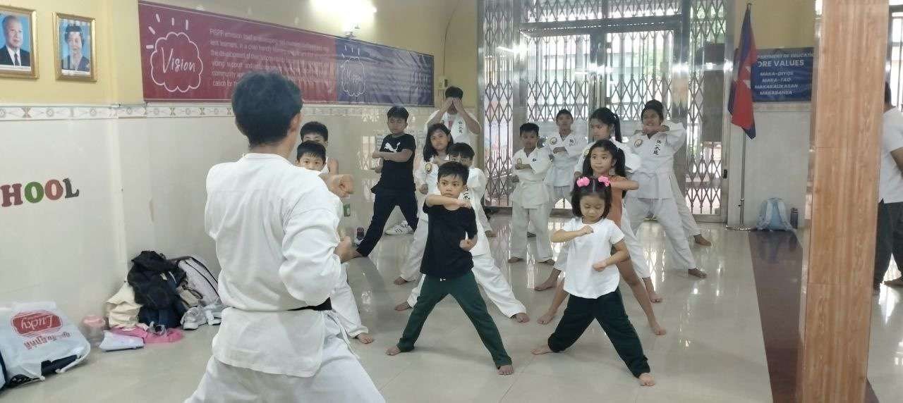Students practicing martial arts at Philippine International School of Phnom Penh's Borey Campus during an after-school session