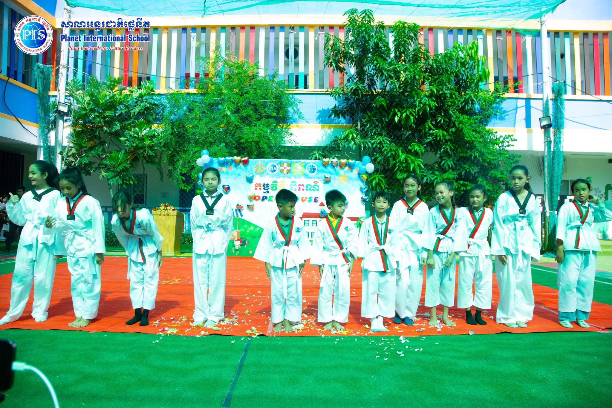 Students and parents participate in creative activities during the Open House at Planet International School Chbar Ampov