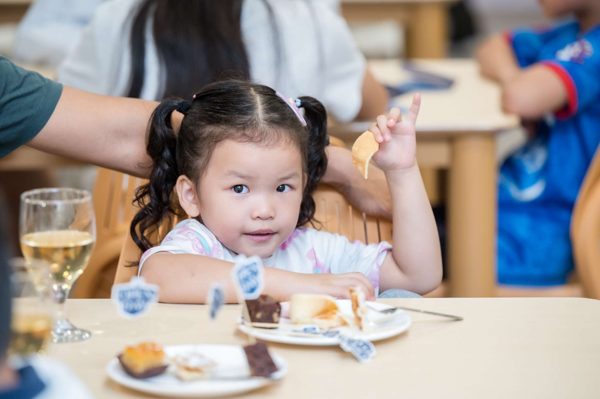 Young student at Reigate Grammar School Phnom Penh enjoying a healthy meal served under the school’s HACCP-certified catering program with Newrest Cambodia