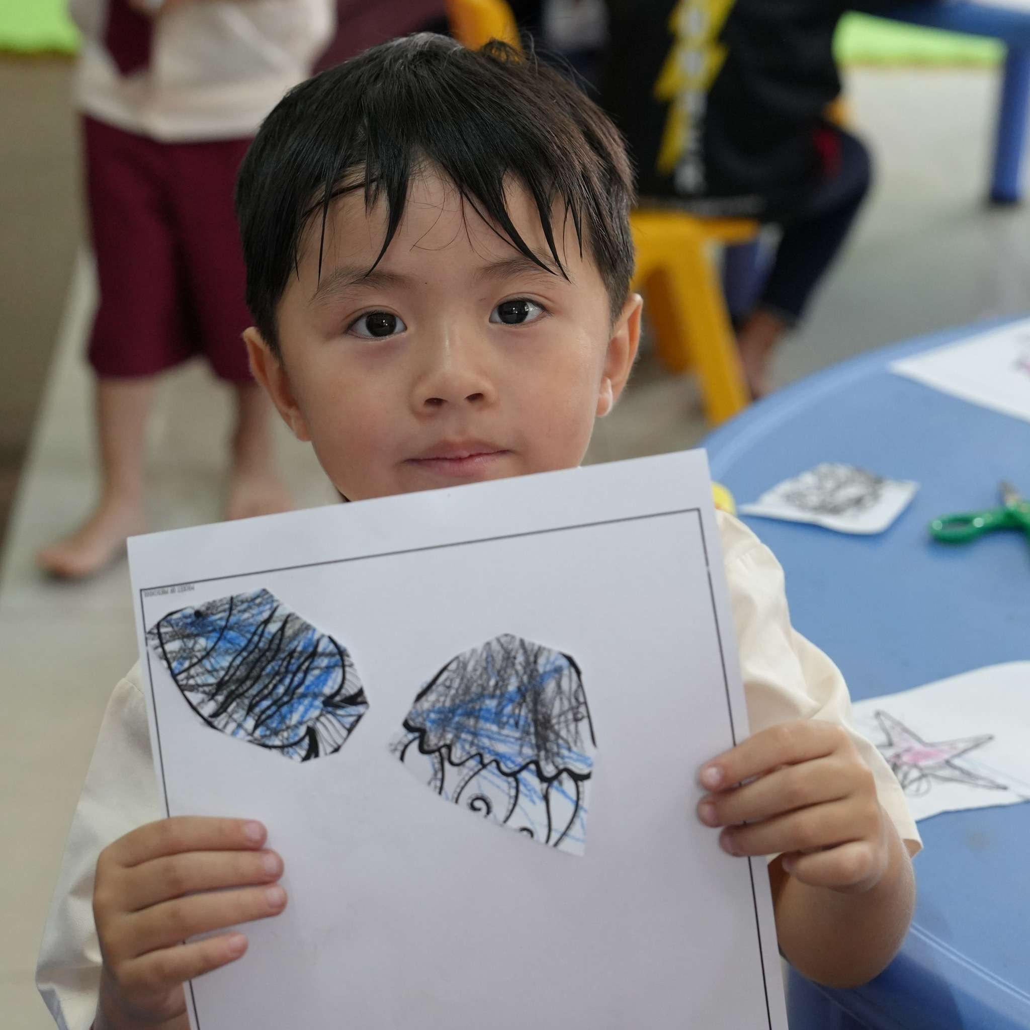 Students at East-West International School Cambodia on the first day of school, focused on classroom activities during the 2025 academic year launch.