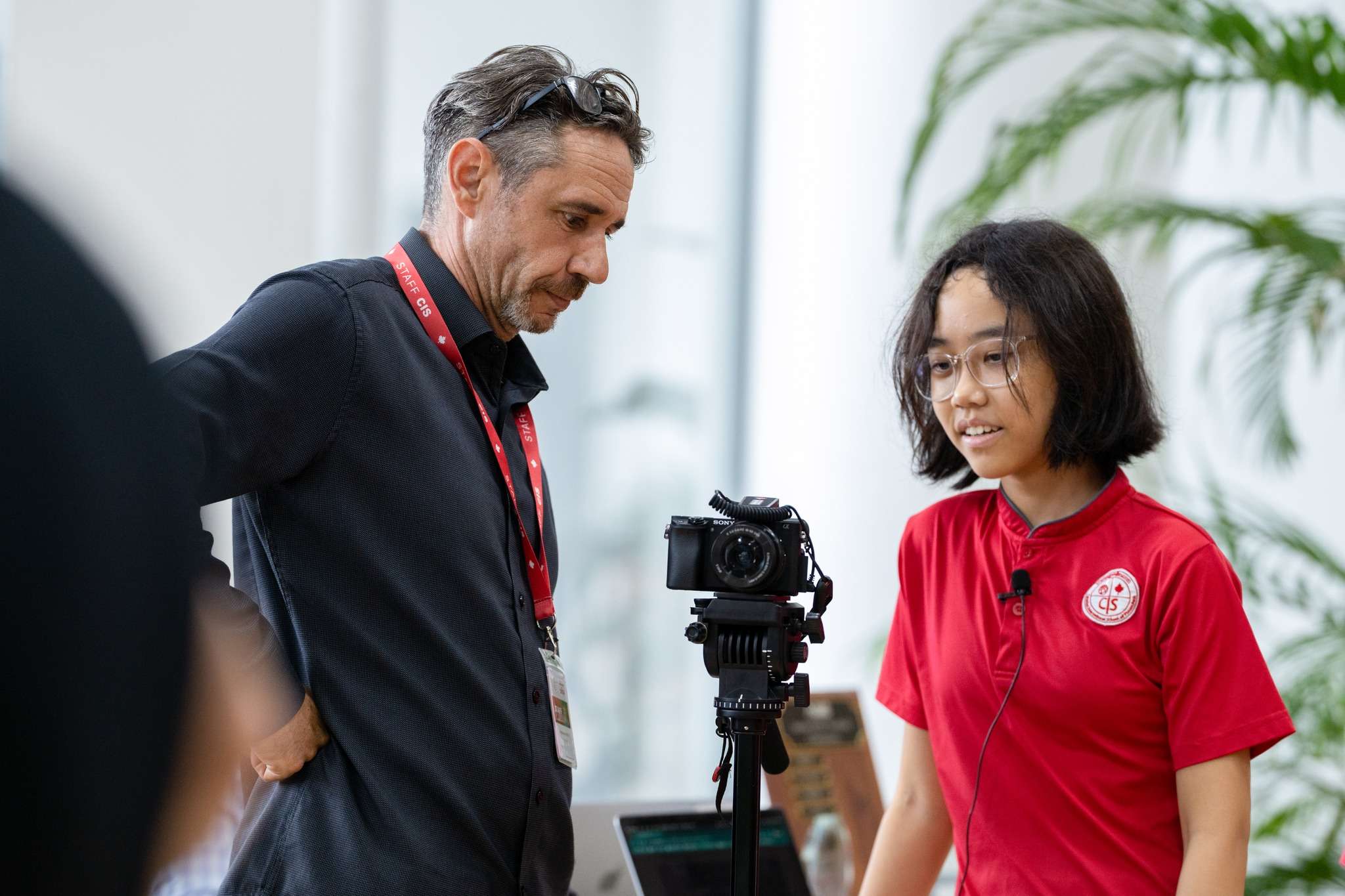 Students and teachers at Canadian International School of Phnom Penh engaging in hands-on learning activities as part of the “Make Your Mark” theme.
