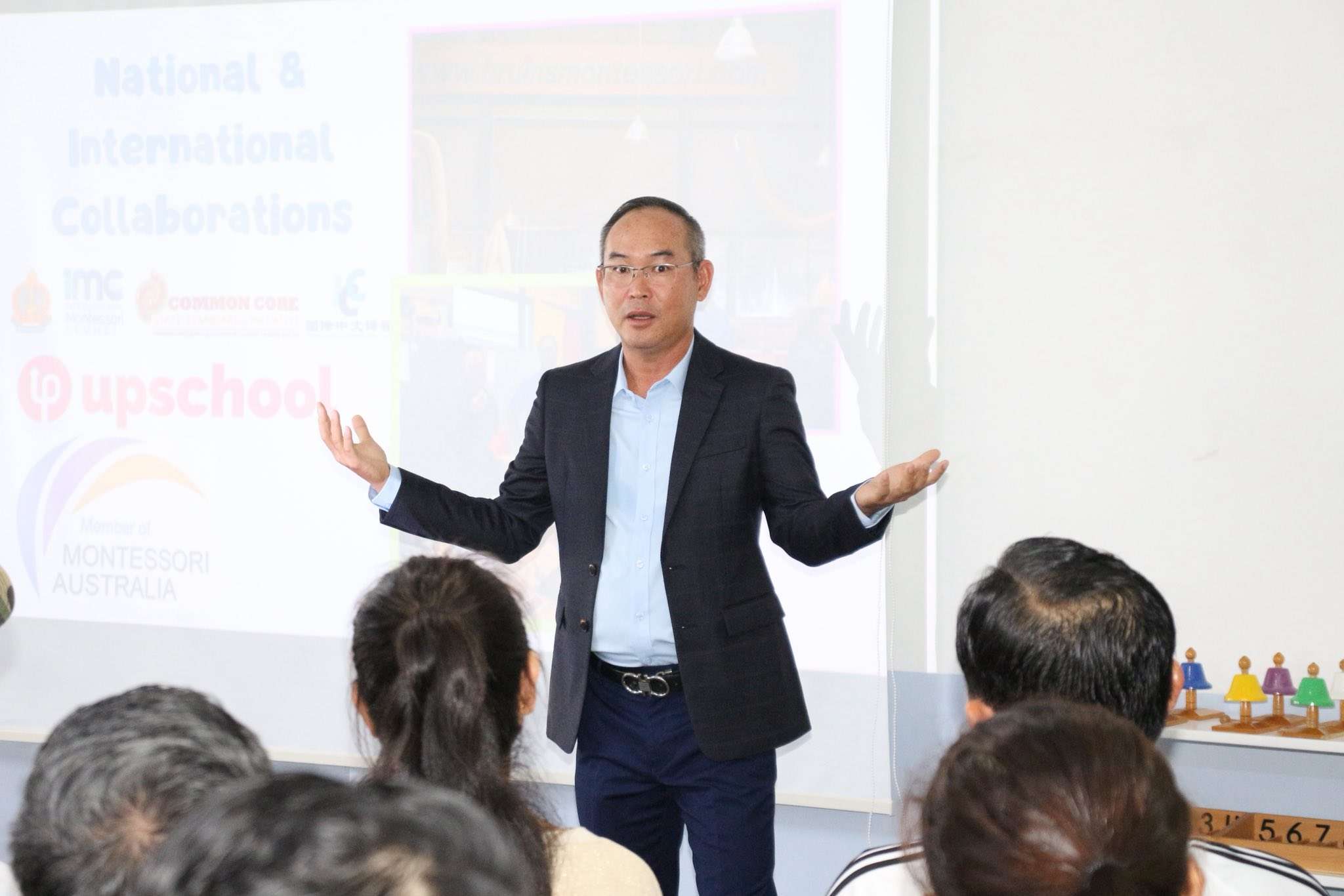 School Director speaking at Parent Orientation at Phnom Penh Montessori International School.