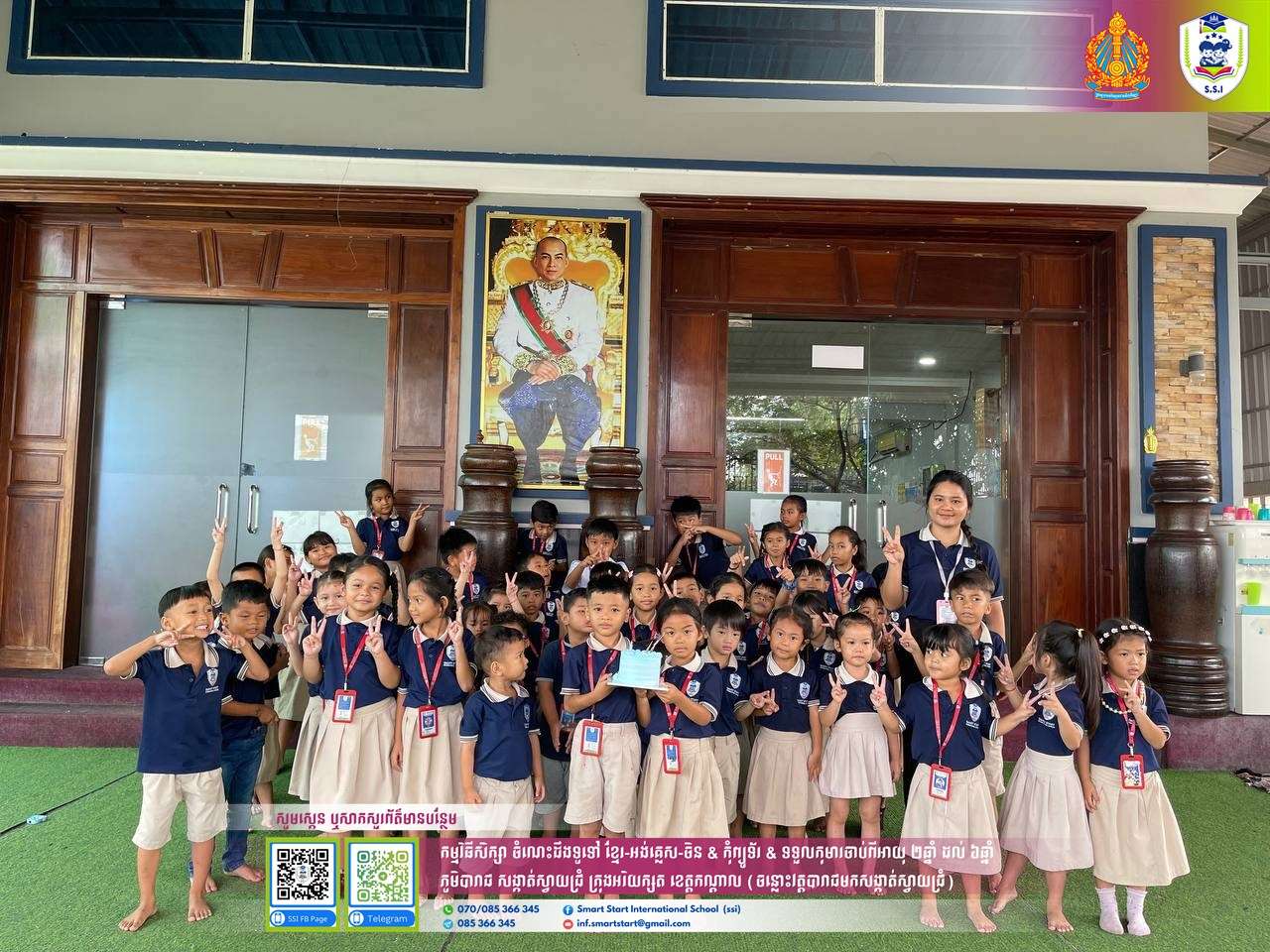 Smart Start International School students and teachers celebrating birthdays of Panya Khantiya and Chea Ratanasambath with cake, smiles, and group photos