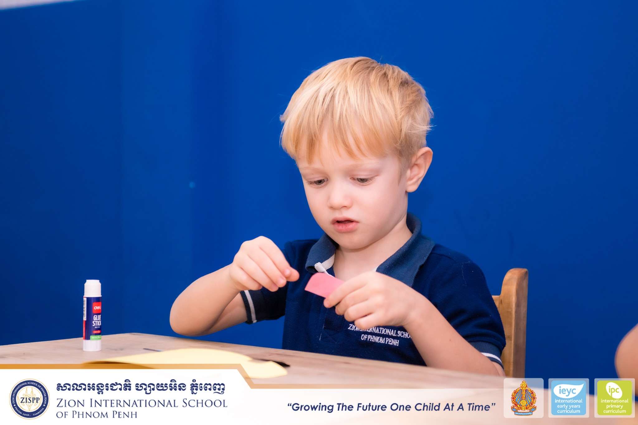 Kindergarten students at Zion International School of Phnom Penh engaged in IEYC creative learning activities.