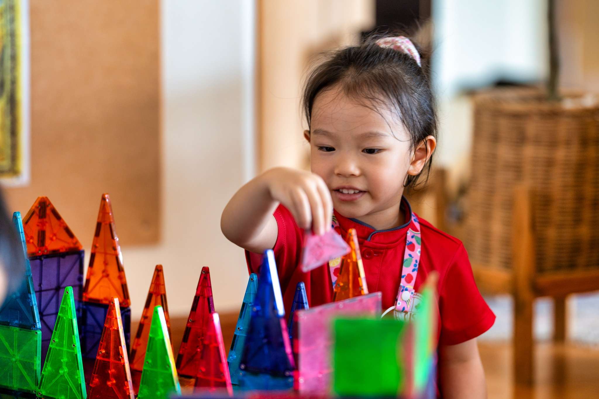 Children at the Canadian International School of Phnom Penh engaging in play-based learning activities during the Bassac Garden Open Day event.