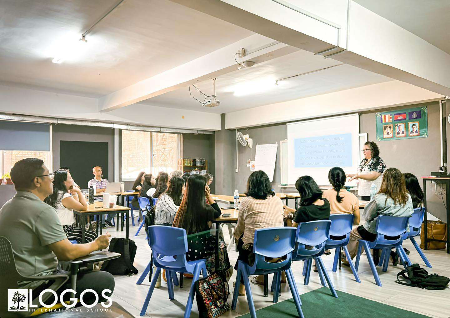 Logos International School staff participating in Biola Training 2025 workshop in Phnom Penh, engaging in professional development and classroom learning activities.