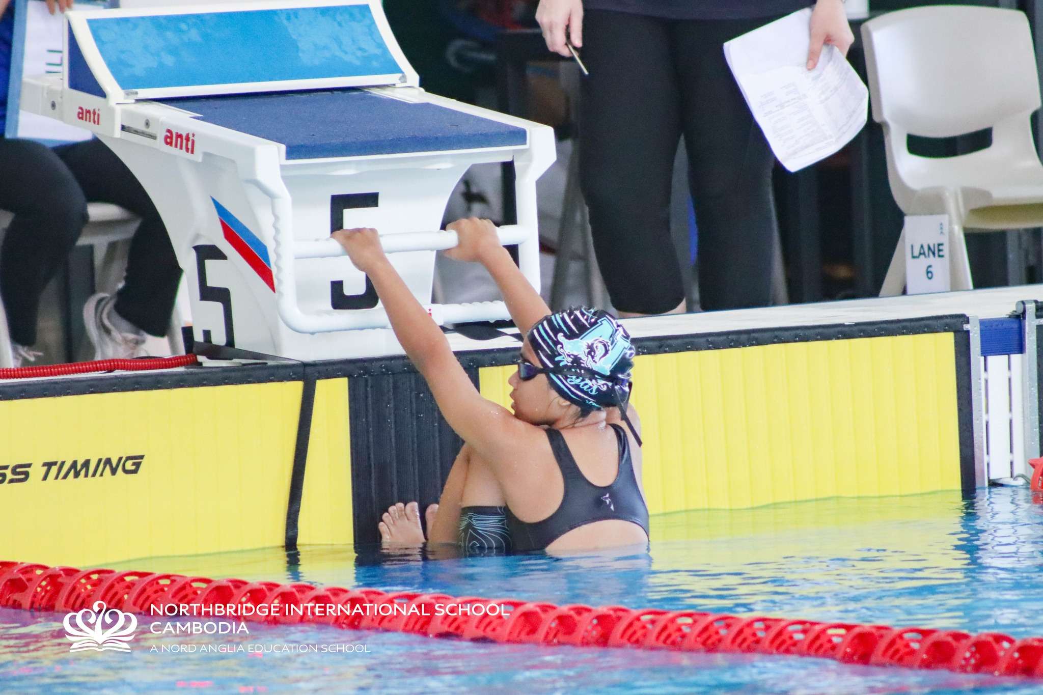 Students from Northbridge International School Cambodia participating in the PAAC8 Grading Meet 2025 swimming competition in Phnom Penh, demonstrating teamwork, dedication, and athletic skill.