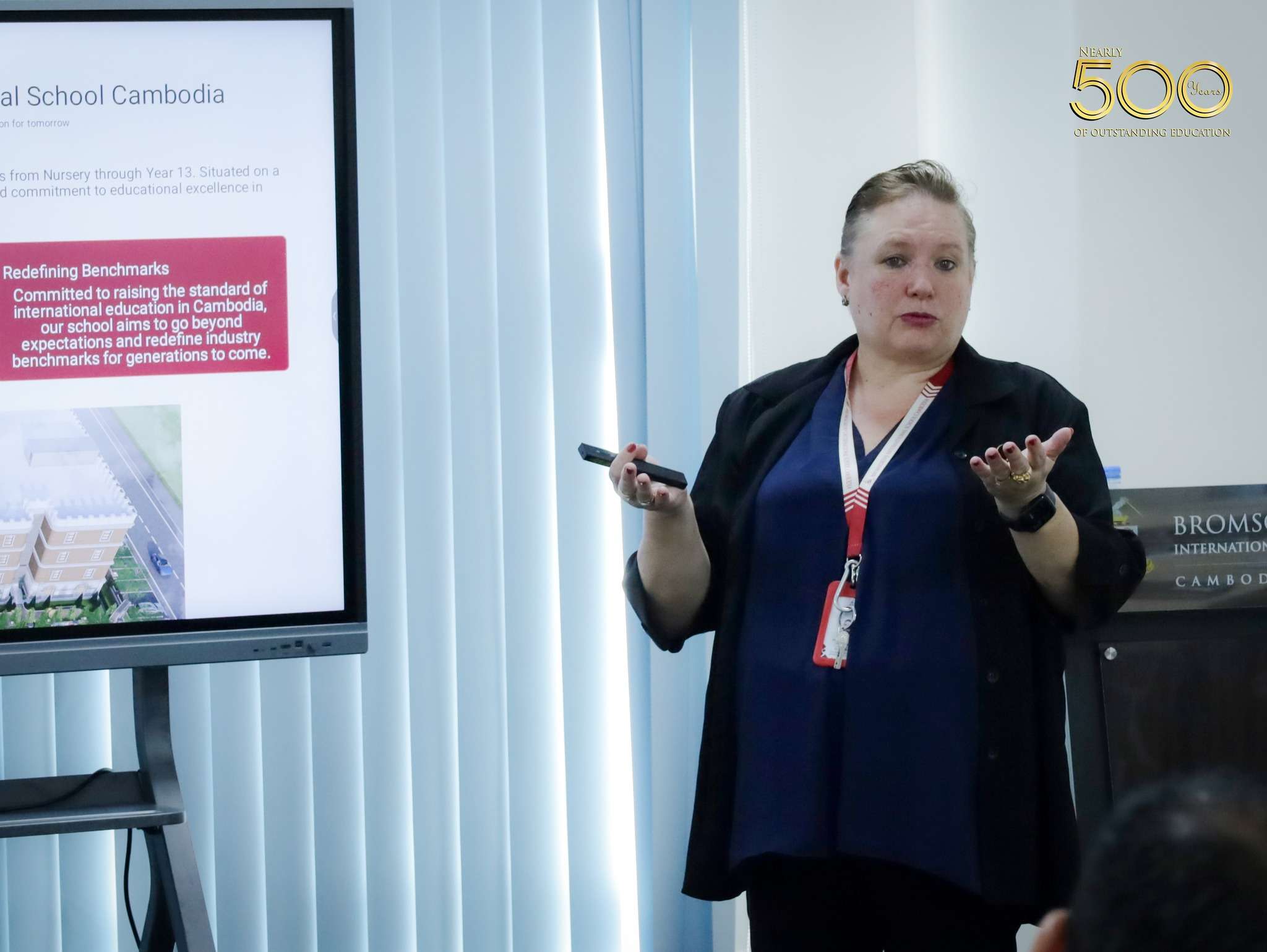 Partners and stakeholders participating in a presentation session at Bromsgrove International School Cambodia.