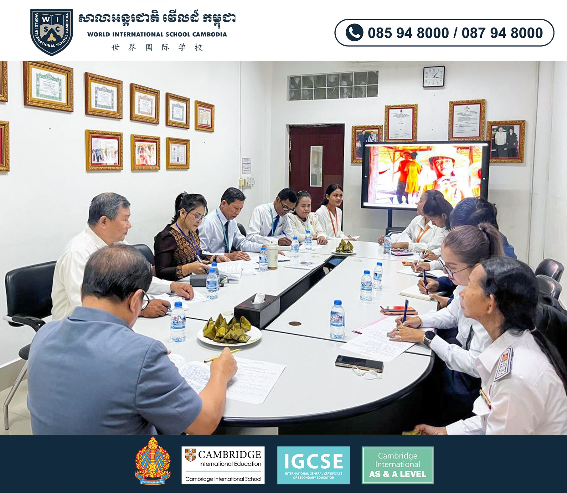 School leadership meeting at World International School Cambodia discussing education programs and future planning.