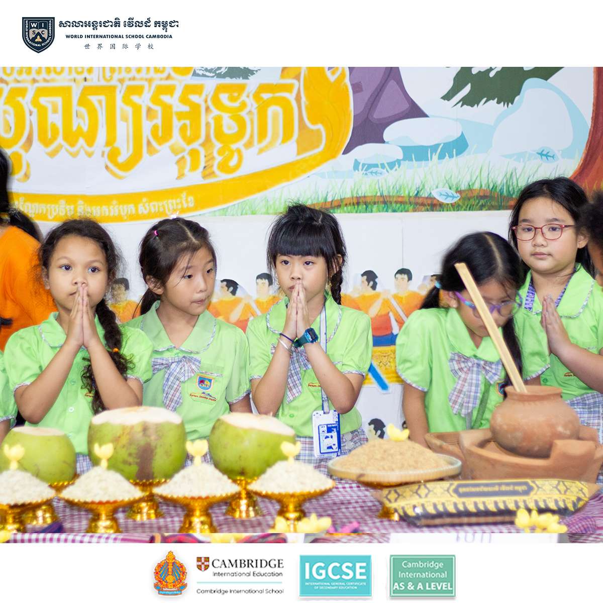 Kindergarten students at World International School Cambodia participating in a creative arts and learning activity on stage