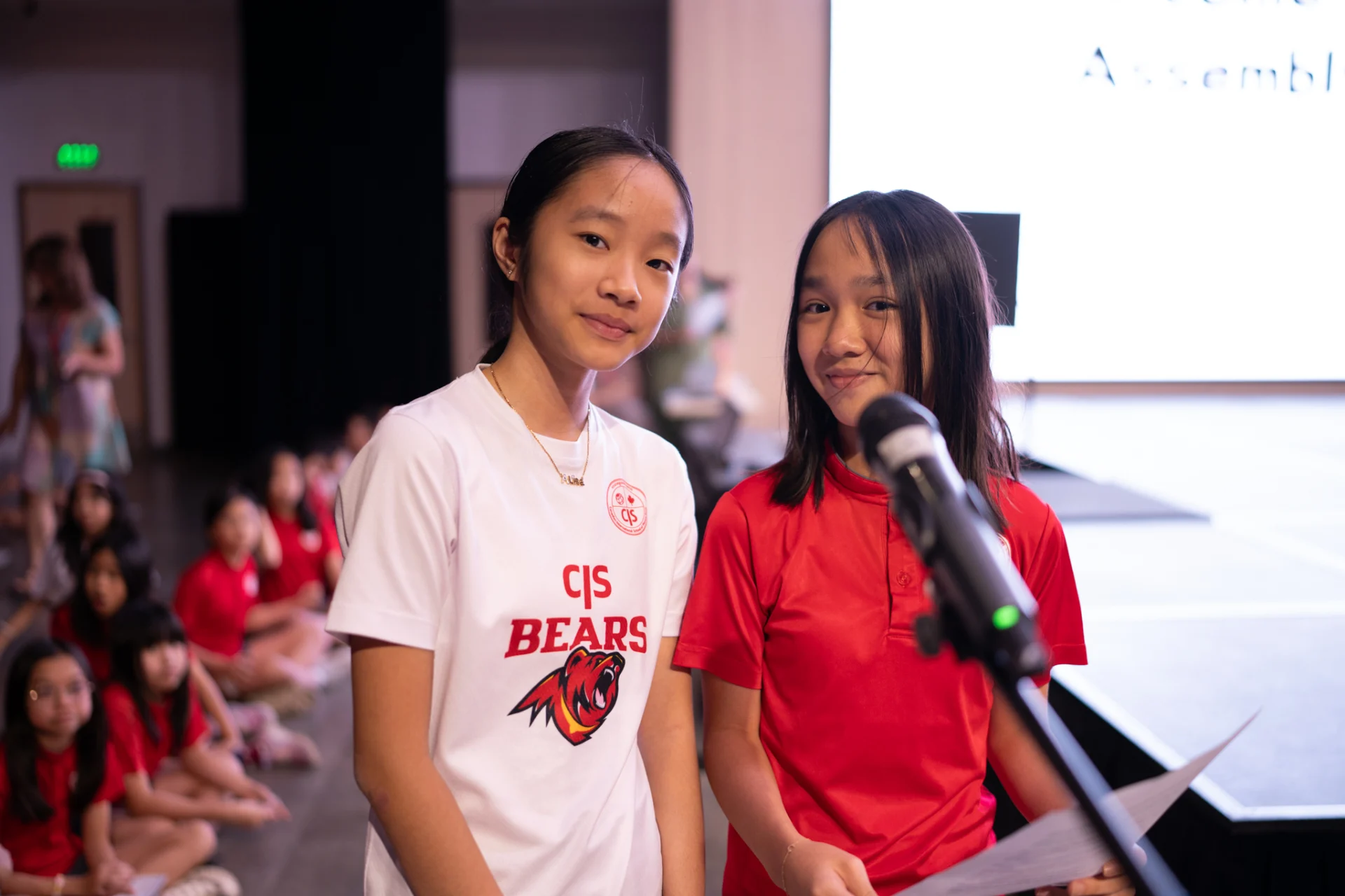 Elementary students at Canadian International School of Phnom Penh participating in a student-led sharing assembly