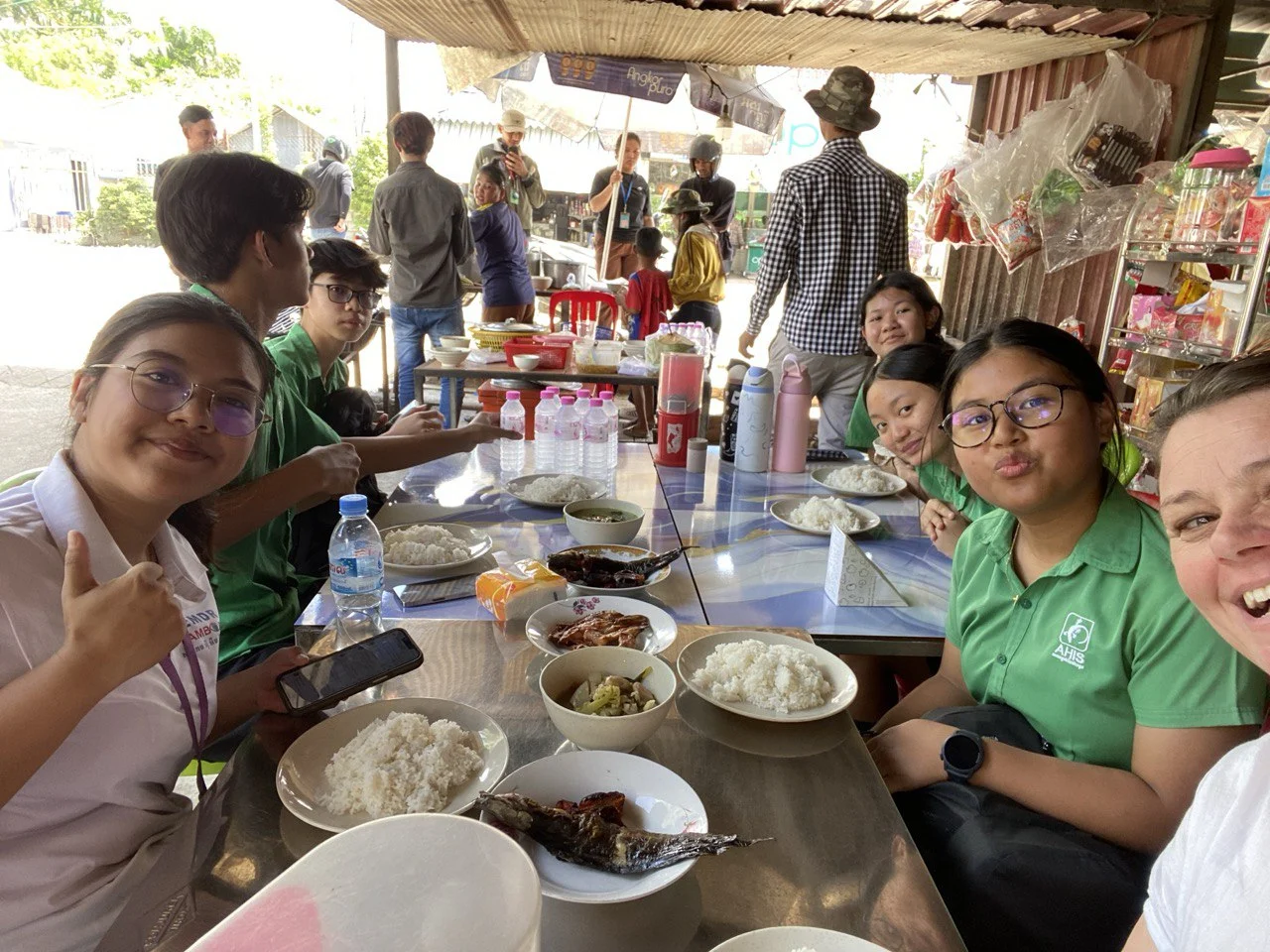 Asian Hope International School Year 10 students visiting Jumpah School in Kampong Speu and donating learning supplies as part of their Global Perspectives Project