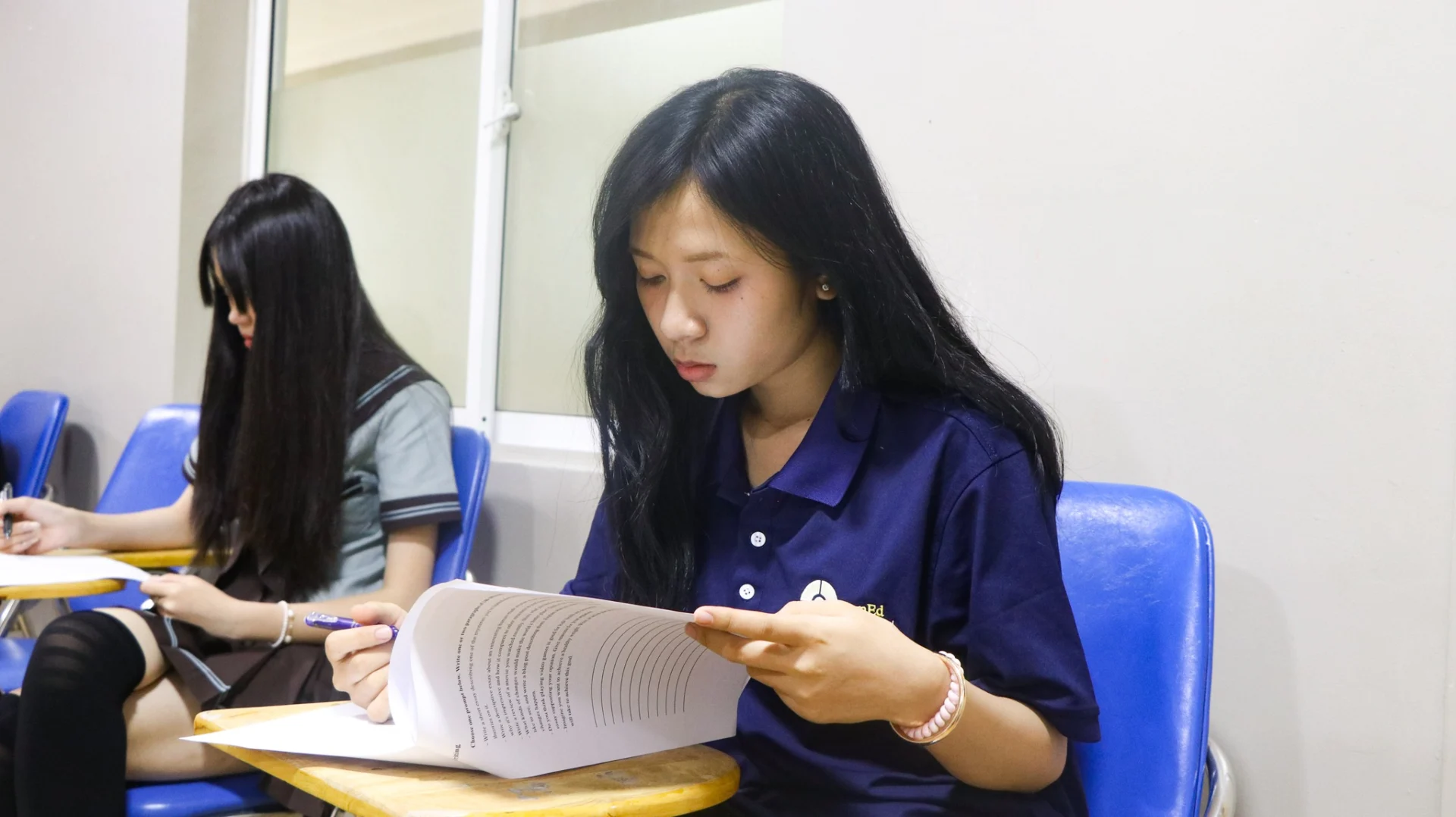 Students participating in the Cambodia Language Academy GEP Final Exam Term 71 in a classroom setting in Cambodia